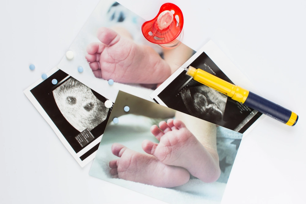 Ultrasonogram picture, syringe with a thin needle and some pills